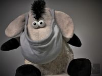 Donkey puppet wearing mask front view detail