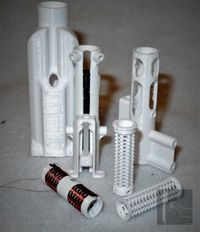 various 3D printed Theremin coil-bobbins and antenna extension-coil assemblies